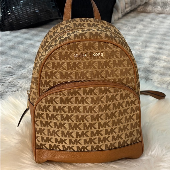 Michael Kors Handbags - Michael Kors Monogram Brown Backpack